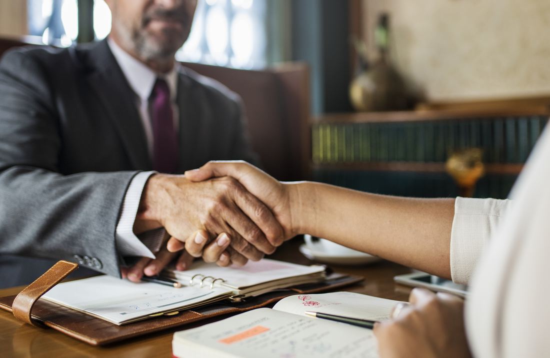Attorney meeting with a client